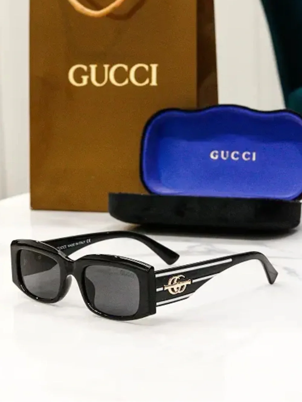 Black Rectangular Sunglasses with Gold Logo Accent